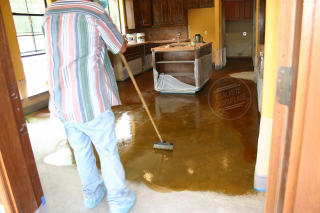 Brushing concrete acid stain